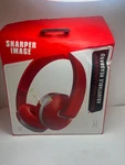 Sharper Image Wireless Titanium Headphones With Adjustable Headband. Fixed Price $12.00.